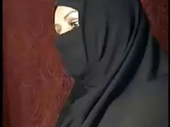 Algeriska fru visar upp---arabiska